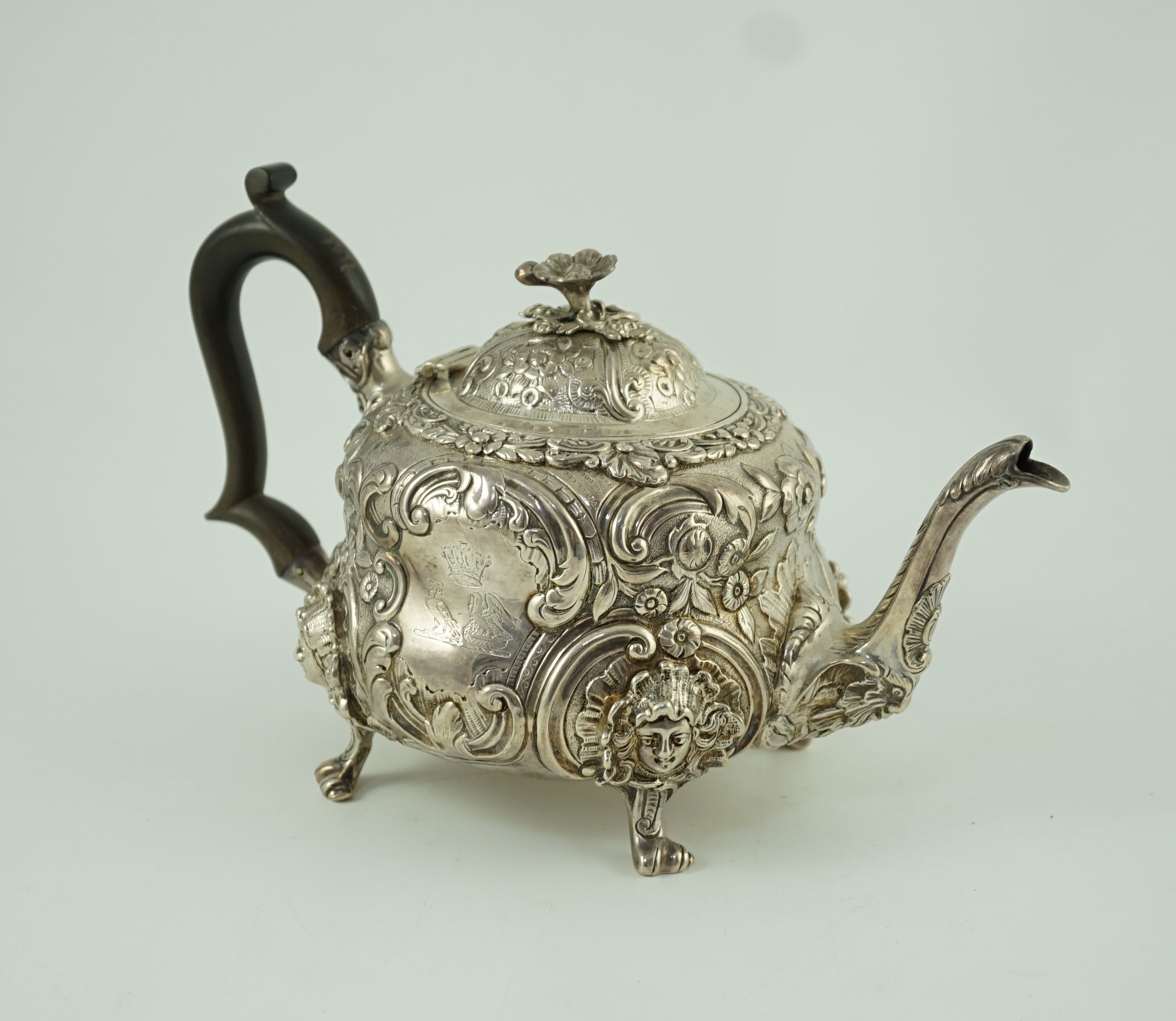 An early Victorian embossed silver teapot, by William Moulson